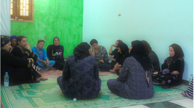 Women in a storytelling circle in Upper Egypt